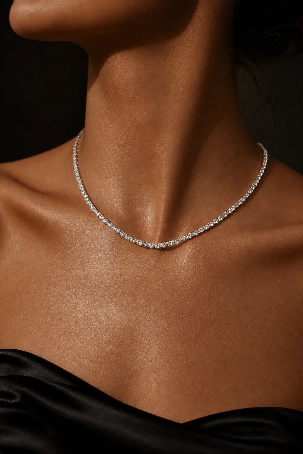 Woman wearing lab-grown diamond jewelry from Trichel & Co. fine diamond jewelry